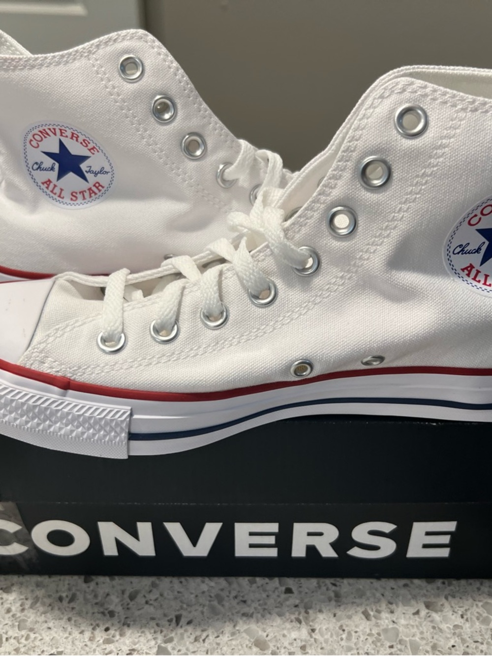 Converse Women’s White High-Top Sneakers with Red & Blue Trim